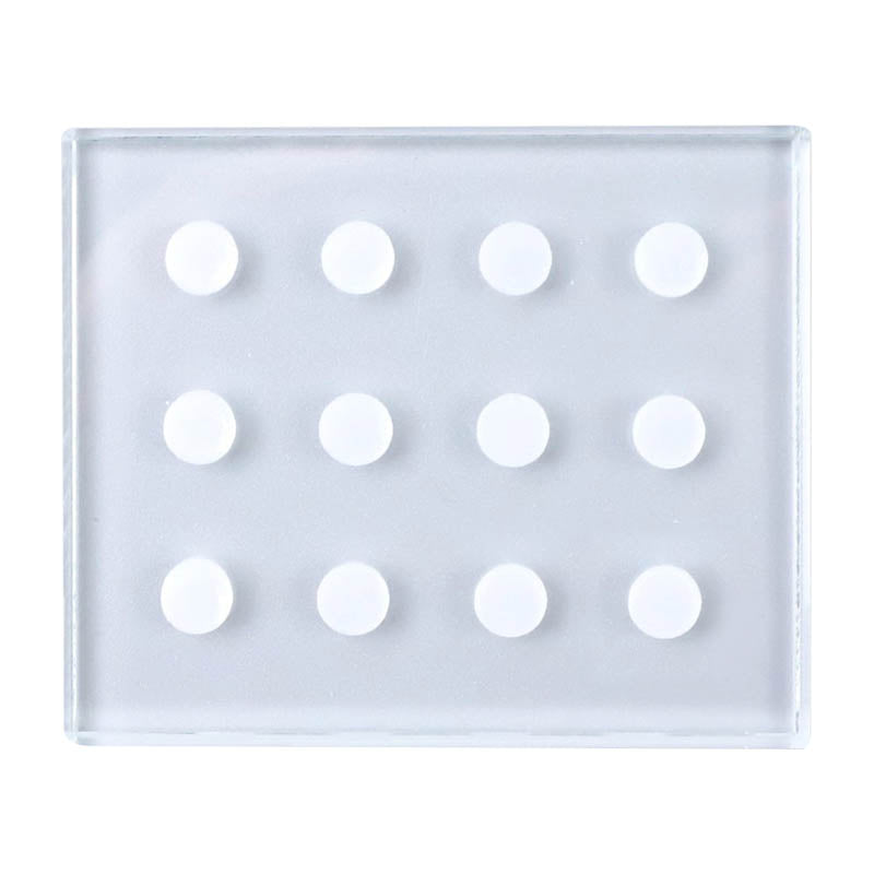 Plaquette à adhésif